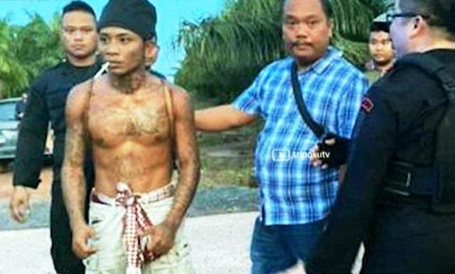 Pajaji saat diamankan Polda Kalimantan Tengah Jumat (5/4/2024) dalam kasus dugaan mengganggu ketertiban umum dan penutupan akses jalan di PT LAK, Kapuas.  (tangkapan layar video)